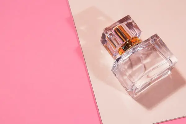 perfume with pink background
